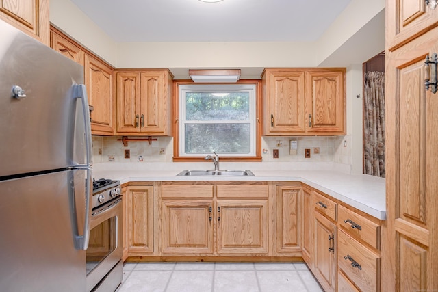 24 Warwick Rd, New Fairfield, CT 06812 - kitchen featuring appliances with stainless steel finishes, tasteful backsplash, light countertops, and light tile patterned floors