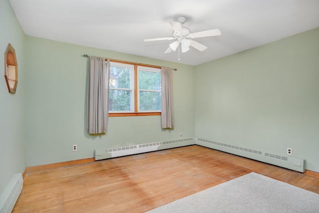 24 Warwick Rd, New Fairfield, CT 06812 - empty room with baseboard heating, wood finished floors, and ceiling fan