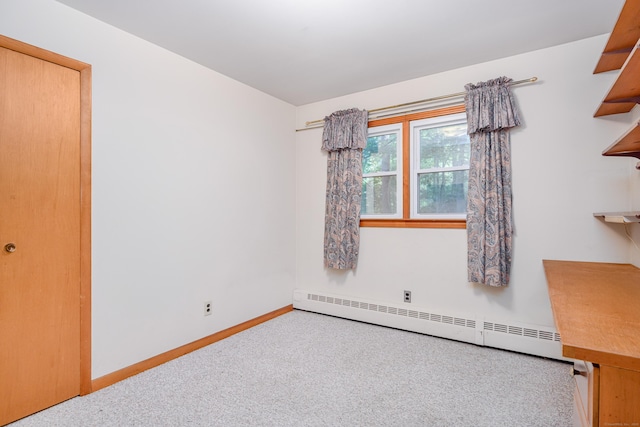 24 Warwick Rd, New Fairfield, CT 06812 - unfurnished bedroom with a baseboard heating unit and carpet