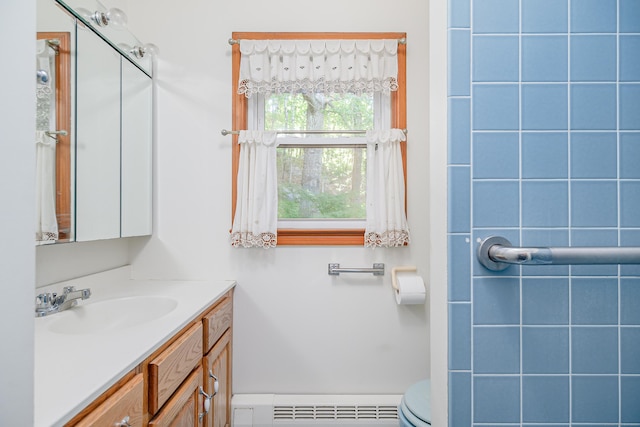 24 Warwick Rd, New Fairfield, CT 06812 - full bathroom featuring a baseboard heating unit, vanity, and a shower