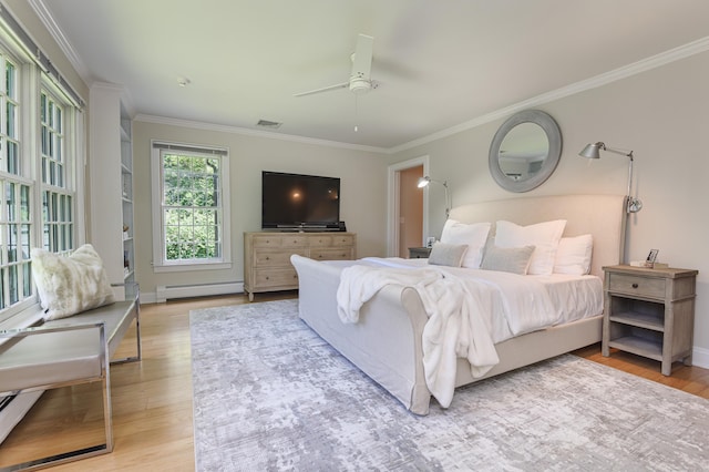 182 Bennetts Farm Rd, Ridgefield, CT 06877 - bedroom featuring a baseboard radiator, ornamental molding, wood finished floors, and ceiling fan