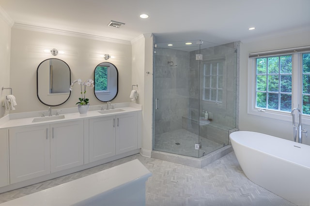 182 Bennetts Farm Rd, Ridgefield, CT 06877 - bathroom featuring a shower stall, a freestanding bath, double vanity, ornamental molding, and recessed lighting