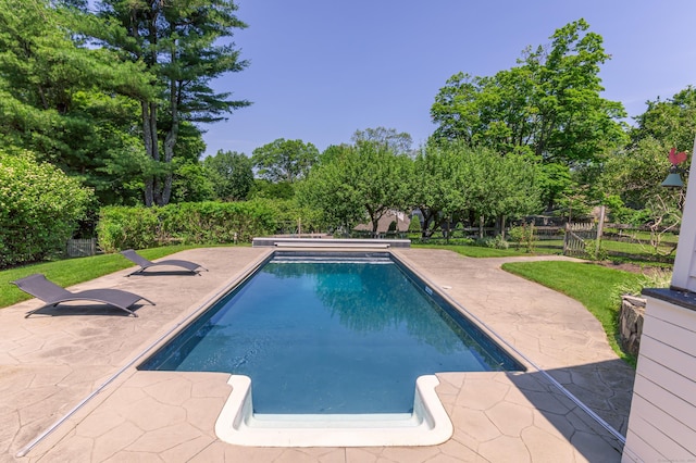 182 Bennetts Farm Rd, Ridgefield, CT 06877 - outdoor pool featuring a patio area and view of scattered trees