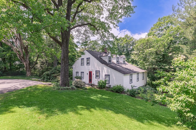 182 Bennetts Farm Rd, Ridgefield, CT 06877 - new england style home featuring a chimney and a front yard