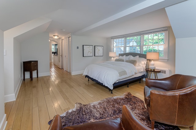 182 Bennetts Farm Rd, Ridgefield, CT 06877 - bedroom with light wood-style floors, multiple windows, and vaulted ceiling