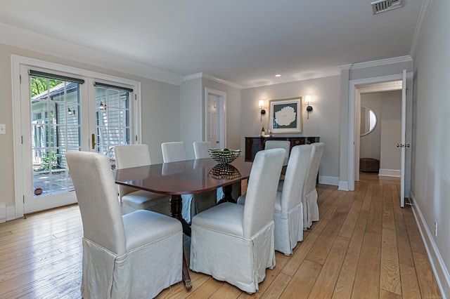 182 Bennetts Farm Rd, Ridgefield, CT 06877 - dining space with light wood-type flooring, french doors, and ornamental molding