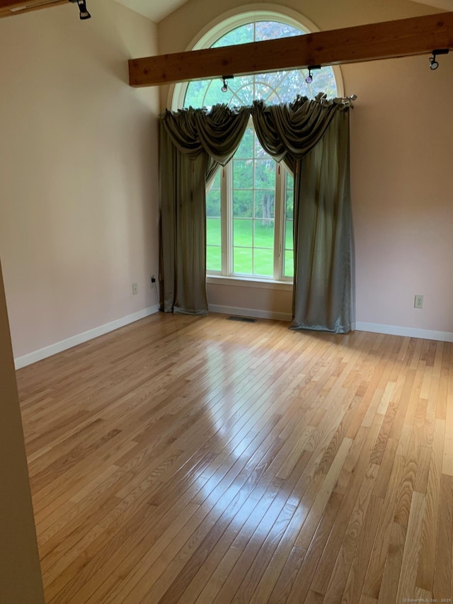 180 Round Hill Rd, Cheshire, CT 06410 - spare room featuring hardwood / wood-style floors and vaulted ceiling