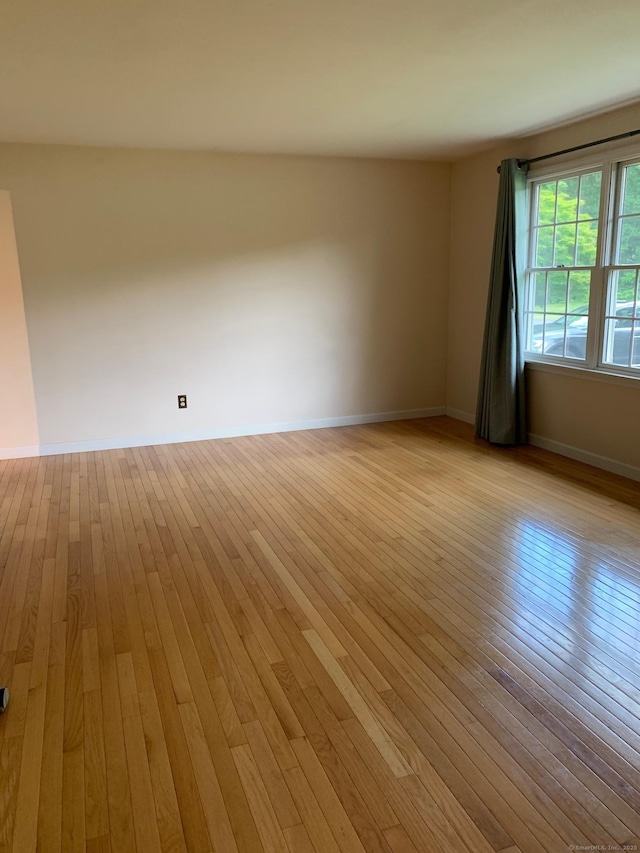 180 Round Hill Rd, Cheshire, CT 06410 - unfurnished room featuring light wood-style flooring and baseboards
