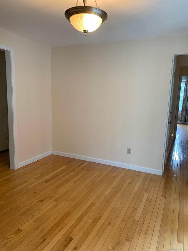 180 Round Hill Rd, Cheshire, CT 06410 - empty room featuring light wood-style floors and baseboards