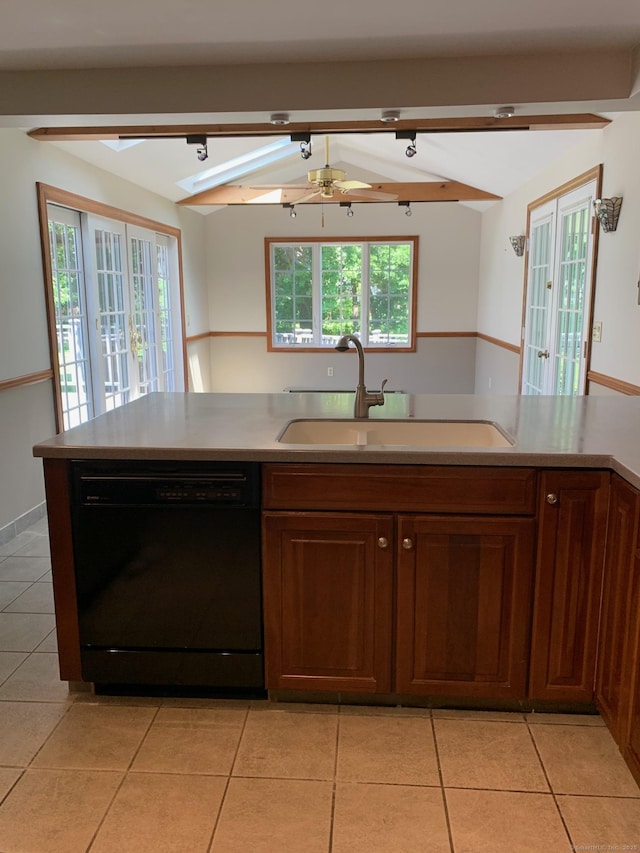 180 Round Hill Rd, Cheshire, CT 06410 - kitchen with black dishwasher, french doors, light countertops, and light tile patterned flooring