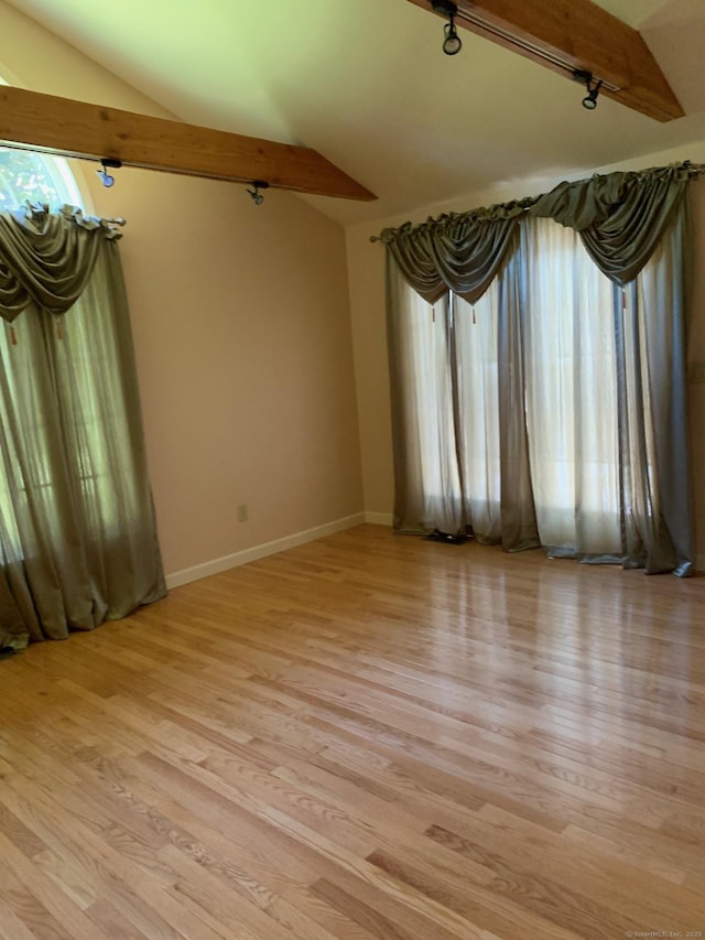 180 Round Hill Rd, Cheshire, CT 06410 - spare room featuring rail lighting, light wood-style floors, and healthy amount of natural light