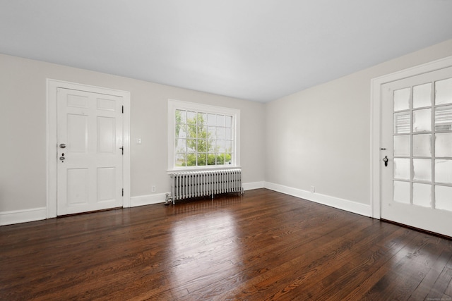 42 Marlboro St, Waterbury, CT 06705 - foyer entrance with radiator heating unit and wood finished floors