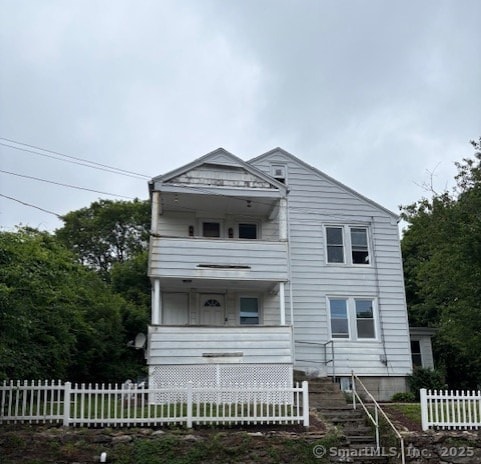 31 Happy St, Norwich, CT 06360 - view of front of property with stairs and covered porch