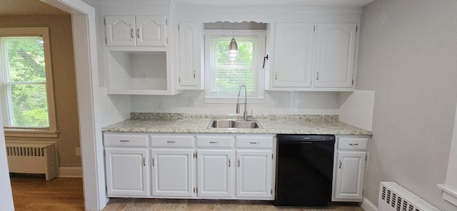 20 Old Stafford Rd, Tolland, CT 06084 - kitchen featuring black dishwasher, radiator heating unit, and white cabinets