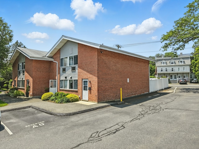 208 Flax Hill Rd Apt 10, Norwalk, CT 06854 - view of property with uncovered parking