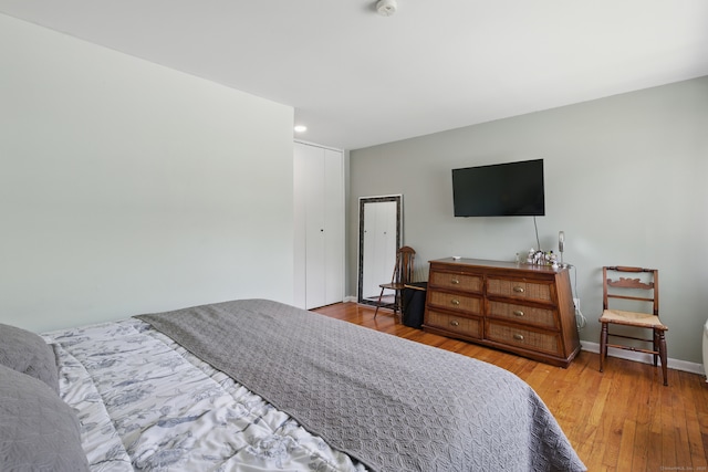 208 Flax Hill Rd Apt 10, Norwalk, CT 06854 - bedroom with wood-type flooring, recessed lighting, and a closet