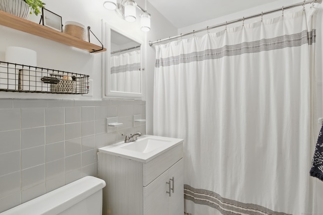 208 Flax Hill Rd Apt 10, Norwalk, CT 06854 - full bath with tile walls, vanity, and a shower with curtain