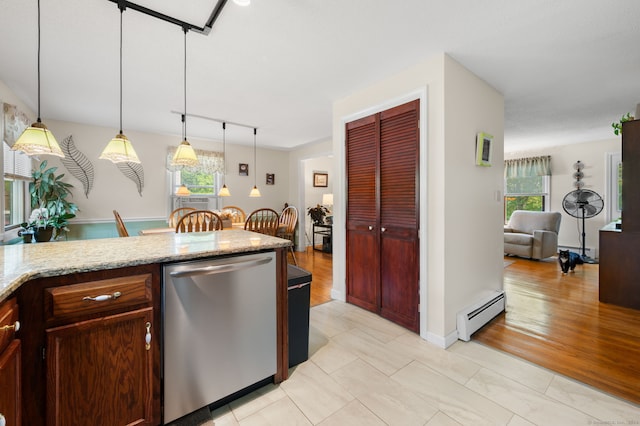 135 Liberty St Unit 135, Clinton, CT 06413 - kitchen featuring dishwasher, baseboard heating, light stone counters, and decorative light fixtures