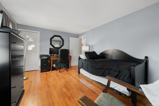 135 Liberty St Unit 135, Clinton, CT 06413 - bedroom with light wood-type flooring and a desk