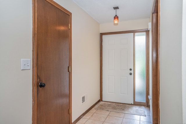 80 Copper Beech Dr Unit 80, Rocky Hill, CT 06067 - foyer featuring light tile patterned floors and baseboards