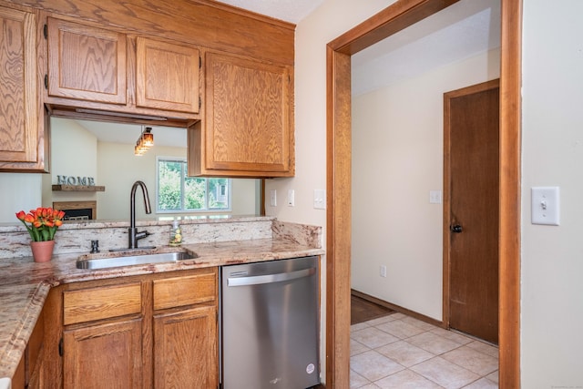 80 Copper Beech Dr Unit 80, Rocky Hill, CT 06067 - kitchen featuring stainless steel dishwasher, light tile patterned floors, light stone counters, and brown cabinets