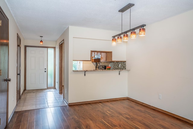 80 Copper Beech Dr Unit 80, Rocky Hill, CT 06067 - foyer entrance with dark wood-style flooring and baseboards