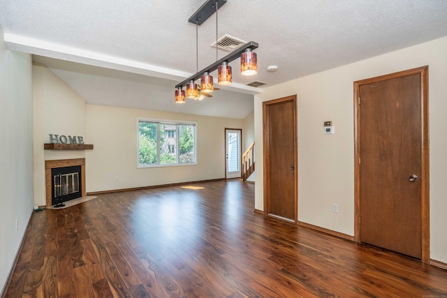 80 Copper Beech Dr Unit 80, Rocky Hill, CT 06067 - unfurnished living room featuring wood finished floors, a fireplace with flush hearth, a textured ceiling, and stairway