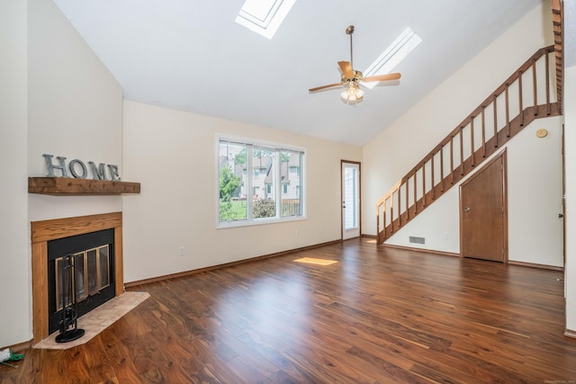 80 Copper Beech Dr Unit 80, Rocky Hill, CT 06067 - unfurnished living room with a skylight, a fireplace with flush hearth, wood finished floors, stairs, and high vaulted ceiling