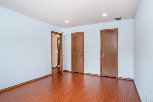 80 Copper Beech Dr Unit 80, Rocky Hill, CT 06067 - unfurnished bedroom featuring light wood-type flooring and recessed lighting