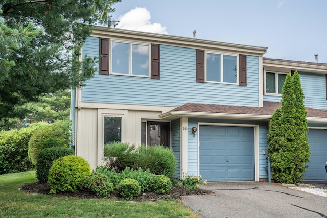 80 Copper Beech Dr Unit 80, Rocky Hill, CT 06067 - view of property with a garage and asphalt driveway