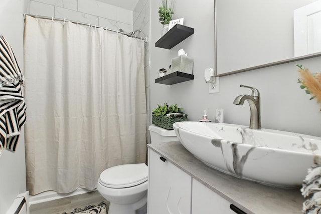 93 S St, Bristol, CT 06010 - bathroom featuring vanity, wood finished floors, and shower / tub combo