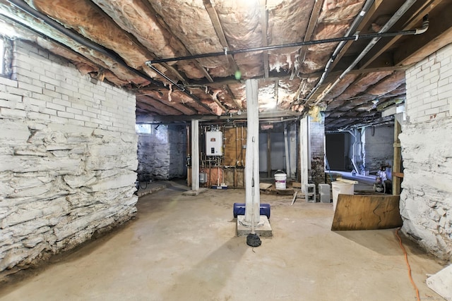 93 S St, Bristol, CT 06010 - unfinished below grade area featuring tankless water heater