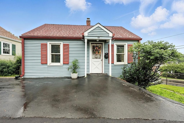85 Peck St, Berlin, CT 06037 - bungalow-style house with a chimney and a shingled roof