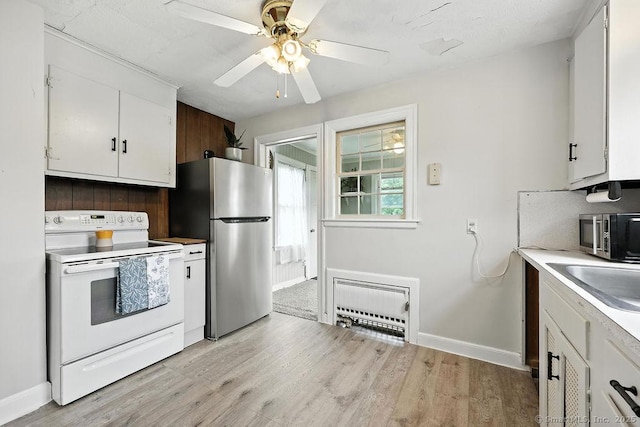 85 Peck St, Berlin, CT 06037 - kitchen with stainless steel appliances, white cabinets, light wood-type flooring, and ceiling fan