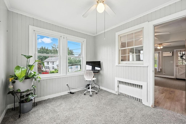 85 Peck St, Berlin, CT 06037 - carpeted home office with radiator, a ceiling fan, ornamental molding, a wall mounted AC, and wood walls