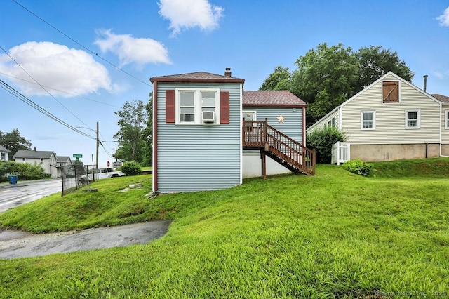85 Peck St, Berlin, CT 06037 - rear view of property with a chimney, a lawn, stairs, cooling unit, and a shingled roof