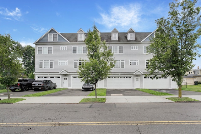 157 Brentwood Ave Unit 157, Fairfield, CT 06825 - townhome / multi-family property with a garage and driveway