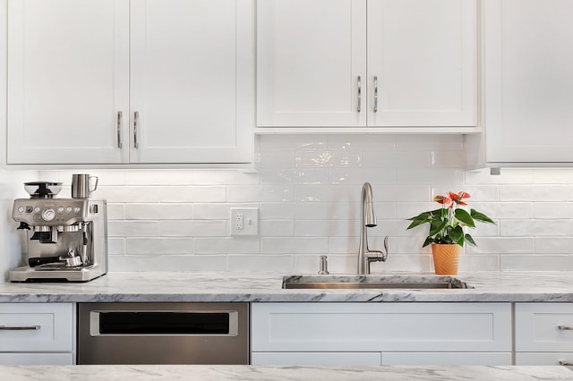 157 Brentwood Ave Unit 157, Fairfield, CT 06825 - kitchen featuring dishwasher, white cabinets, and decorative backsplash