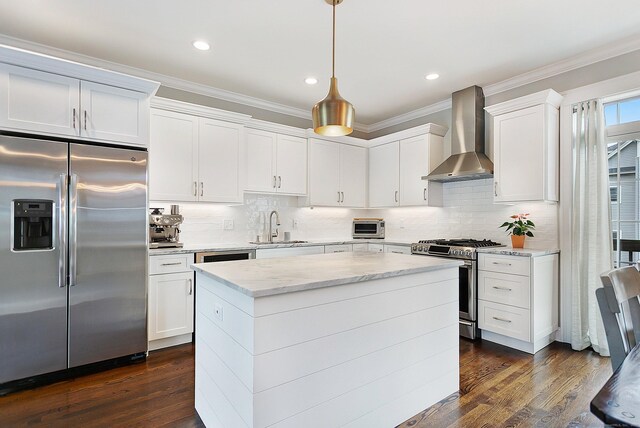 157 Brentwood Ave Unit 157, Fairfield, CT 06825 - kitchen featuring stainless steel appliances, wall chimney range hood, a center island, white cabinets, and dark wood finished floors
