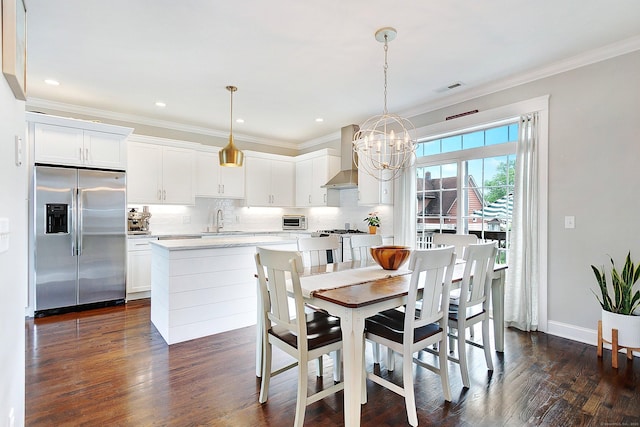 157 Brentwood Ave Unit 157, Fairfield, CT 06825 - dining area featuring a chandelier, crown molding, dark wood-style floors, and recessed lighting