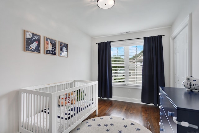 157 Brentwood Ave Unit 157, Fairfield, CT 06825 - bedroom with wood finished floors and a nursery area
