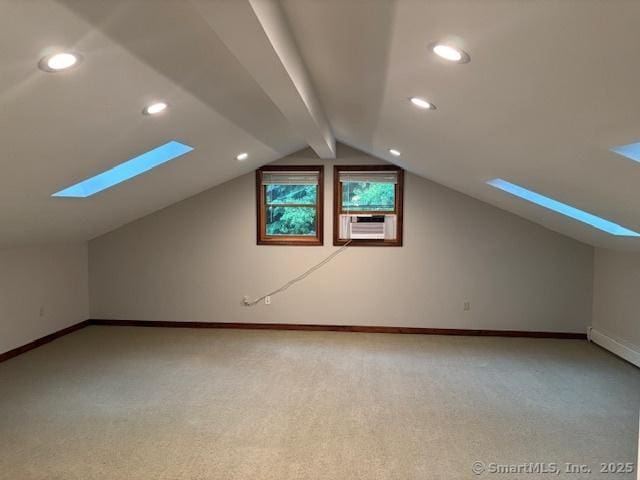 56 Cedar Swamp Rd, Mansfield, CT 06268 - additional living space with a skylight, light colored carpet, vaulted ceiling, cooling unit, and recessed lighting