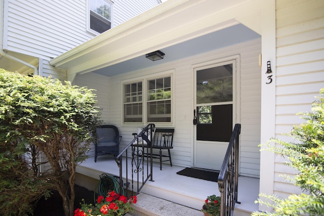 3 Deerfield Dr, Clinton, CT 06413 - doorway to property featuring a porch