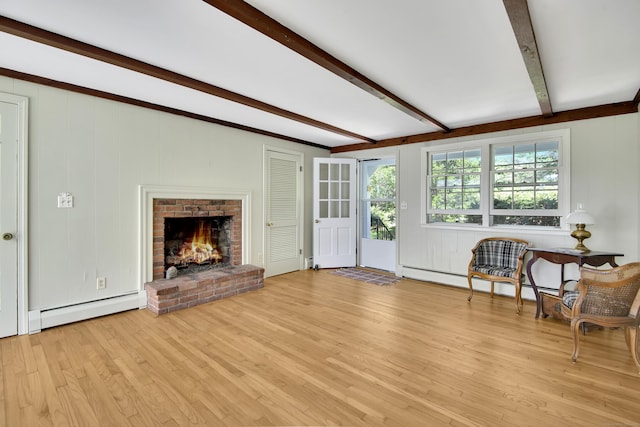 3 Deerfield Dr, Clinton, CT 06413 - unfurnished living room with baseboard heating, beam ceiling, light wood-type flooring, a baseboard heating unit, and a brick fireplace