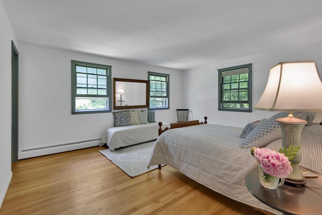 3 Deerfield Dr, Clinton, CT 06413 - bedroom with baseboard heating and wood finished floors
