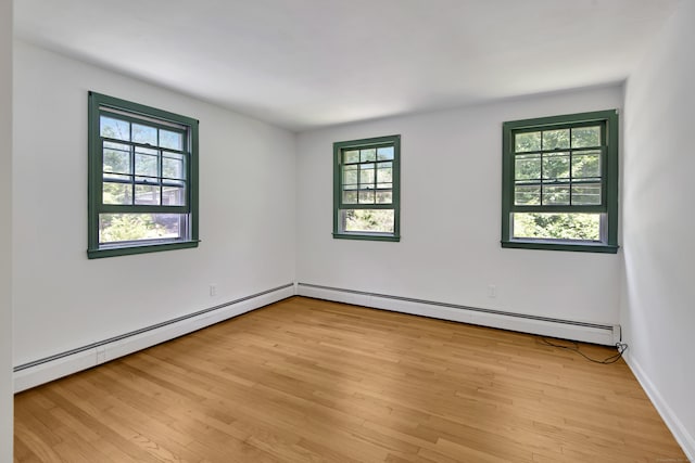 3 Deerfield Dr, Clinton, CT 06413 - empty room with plenty of natural light and baseboard heating