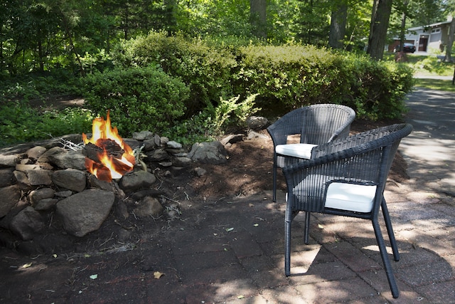 3 Deerfield Dr, Clinton, CT 06413 - view of patio / terrace with a fire pit