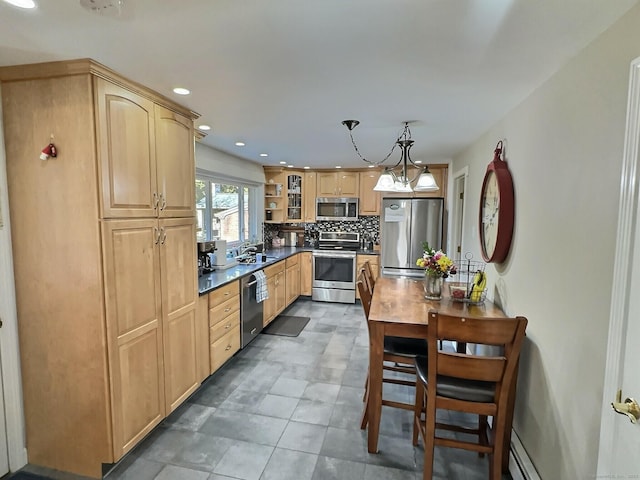 4380 Whitney Ave, Hamden, CT 06518 - kitchen with appliances with stainless steel finishes, decorative backsplash, light brown cabinetry, recessed lighting, and hanging light fixtures