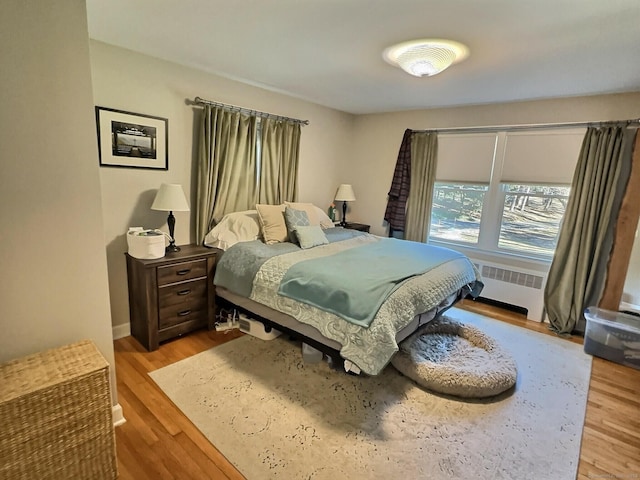 4380 Whitney Ave, Hamden, CT 06518 - bedroom with radiator and wood finished floors