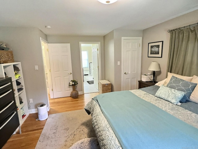 4380 Whitney Ave, Hamden, CT 06518 - bedroom with wood finished floors and baseboards